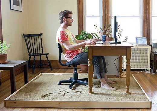 Justin Kemp, inspired by the Beach Boys, set up a sandbox for his workspace