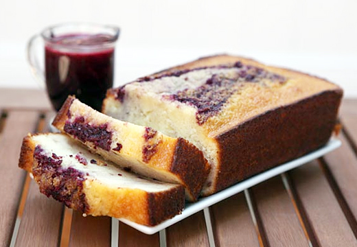 Great looking shot of a Lemon Blackberry Swirl pound cake by Lara Swanson