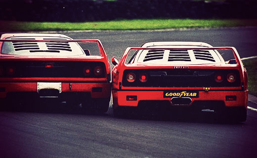 A Ferrari F40 takes on another in a race dated 5th July 1998
